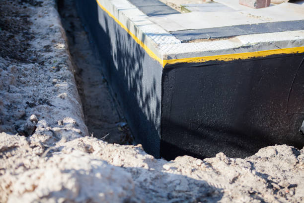 Professional Waterproofing technician working in Geneva, IL